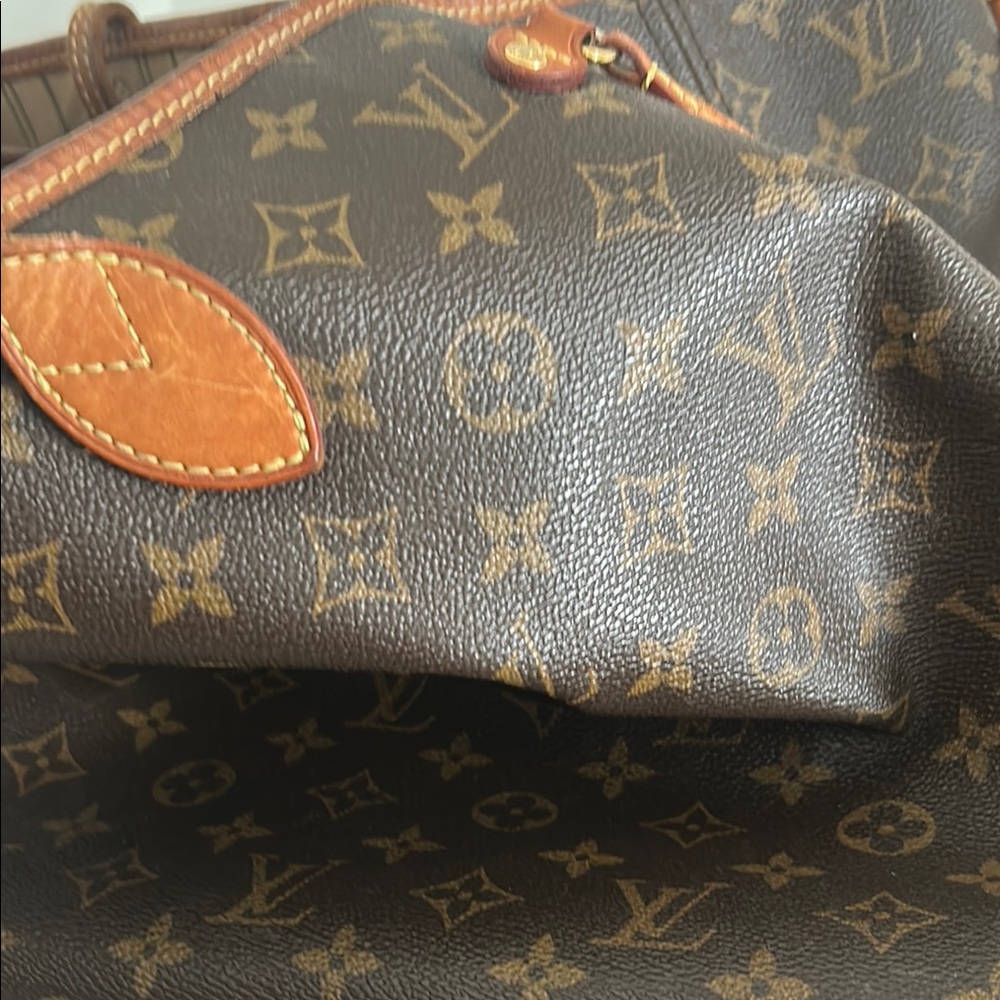 Louis Vuitton Tan and Brown Travel Bag with Iconic Monogram